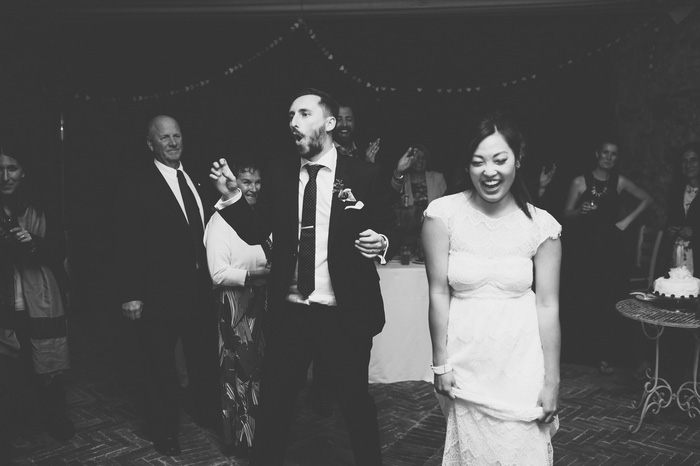 bride and groom dancing at ceremony