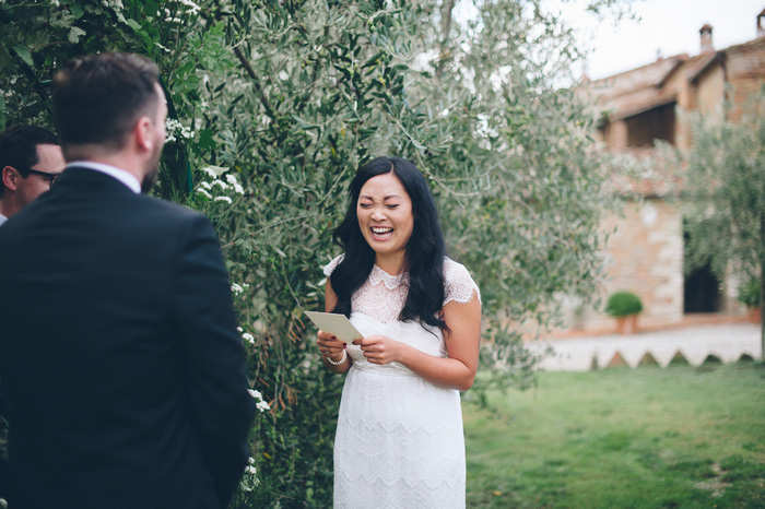 bride laughing during ceremony