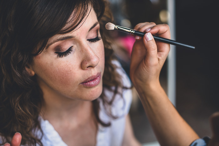 bride getting her make-up done