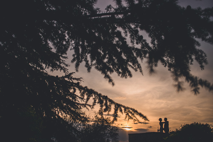 bride and groom at sunset