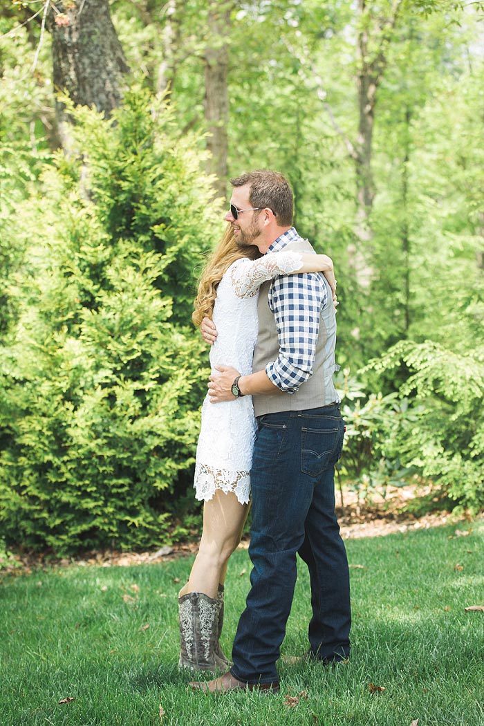 bride and groom hugging