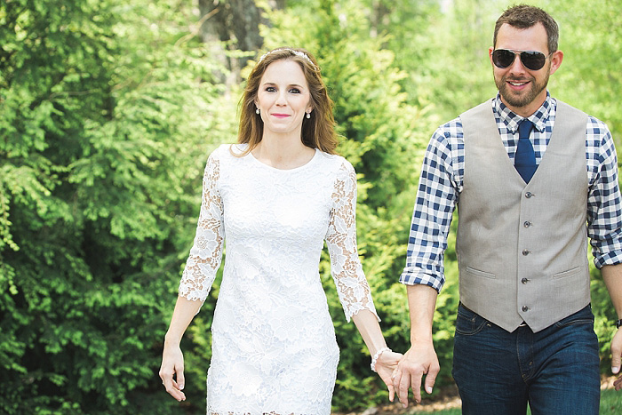 bride and groom walking hand in hand