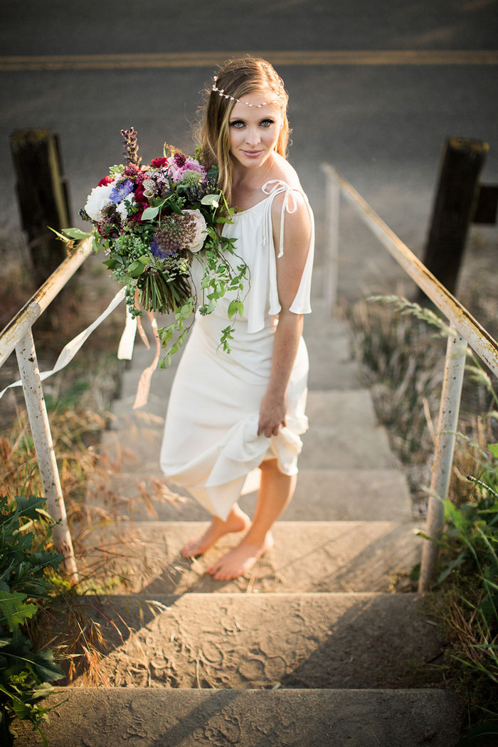 bride on beach steps