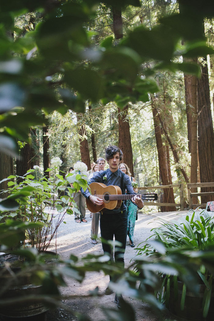 guitarist led wedding procession in the woods