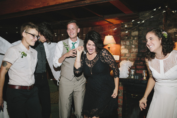 brides dancing with wedding guests