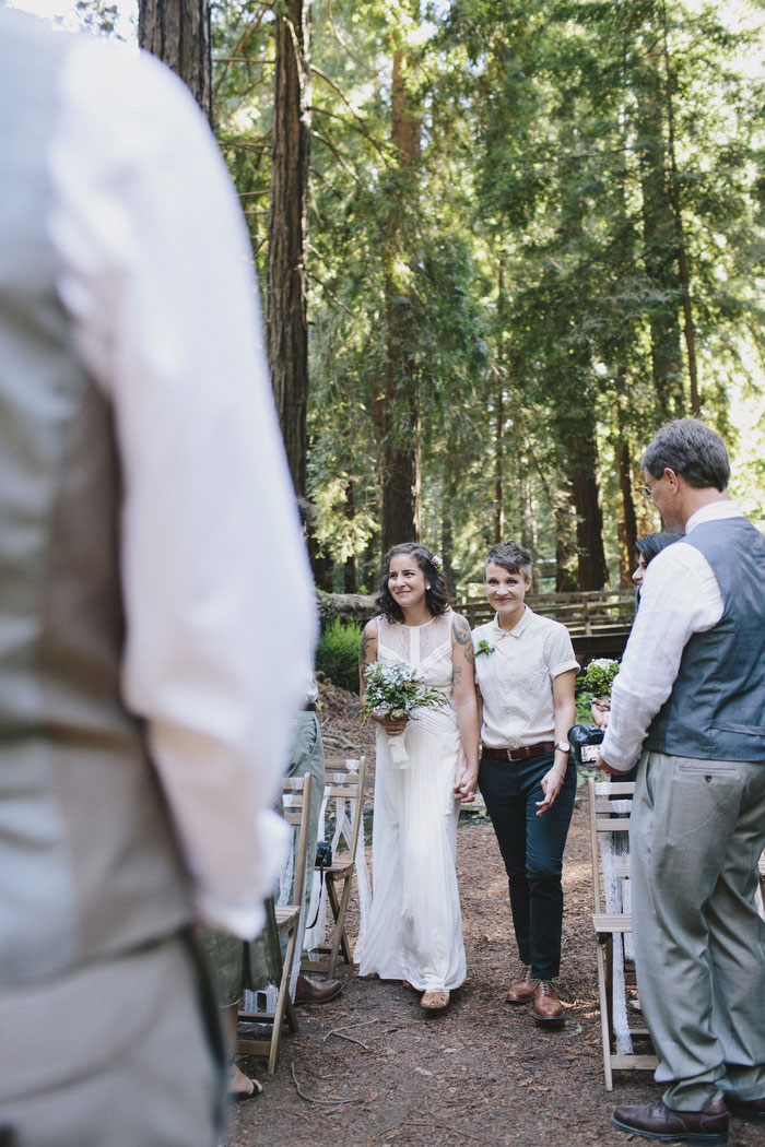 brides walking down the aisle together