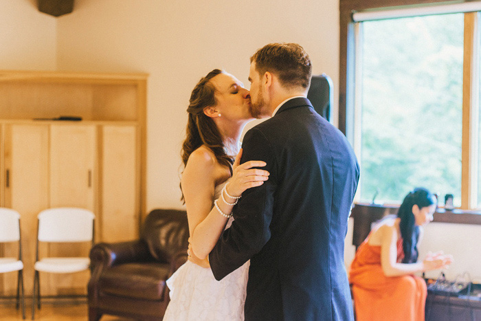 bride and groom kissing during first dance