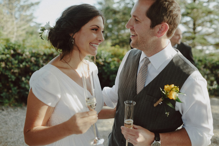 bride and groom with champagne