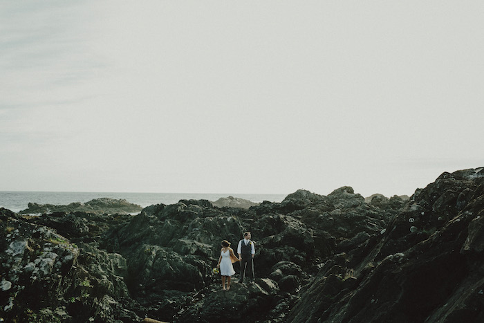 bride and groom portrait on the rocks