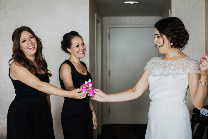 bride toasting with her bridesmaids