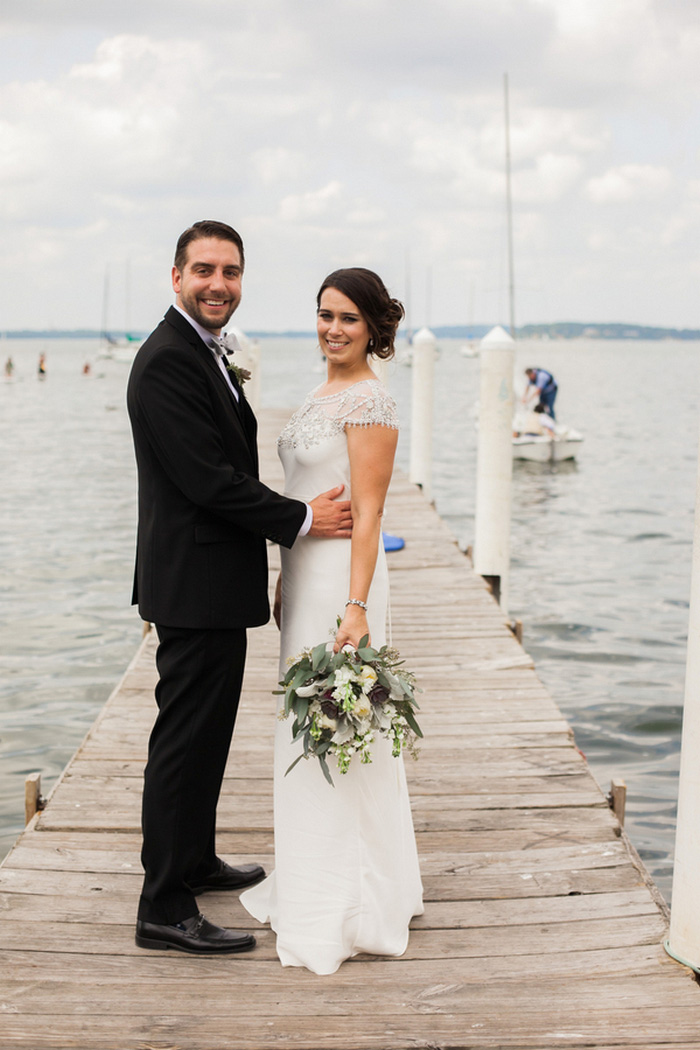 bride and groom portrait by the water