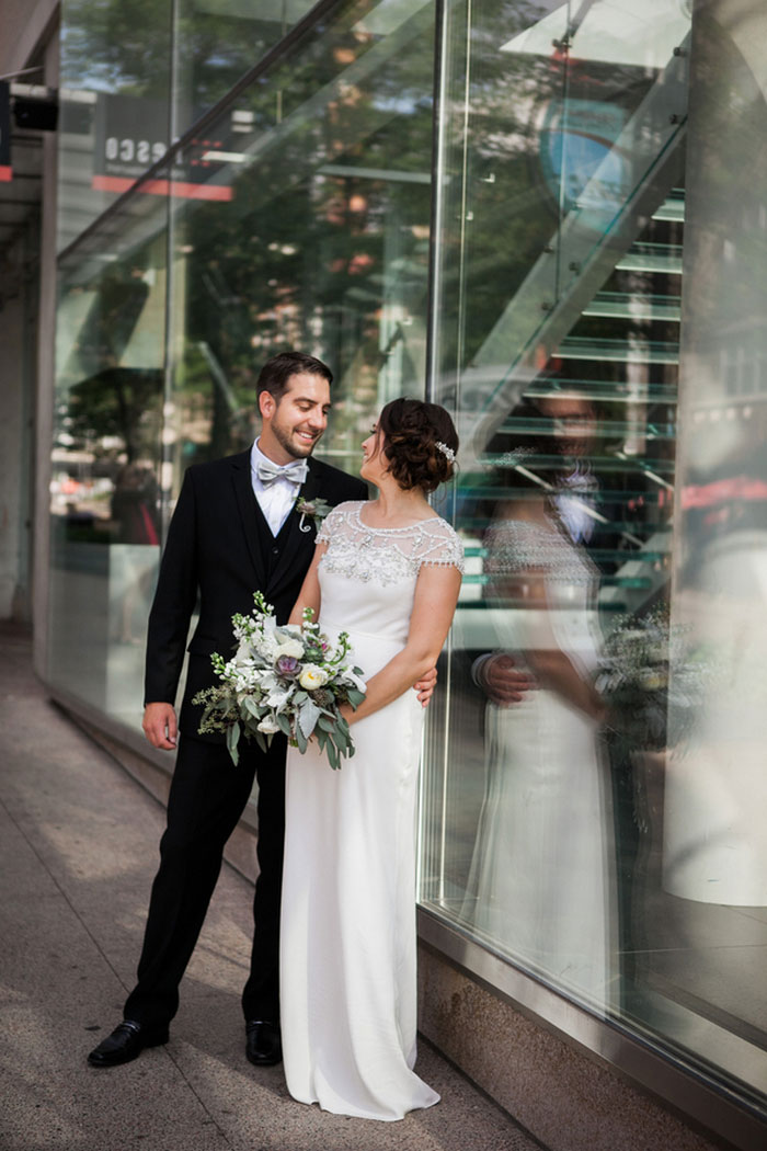 bride and groom portrait outside museum