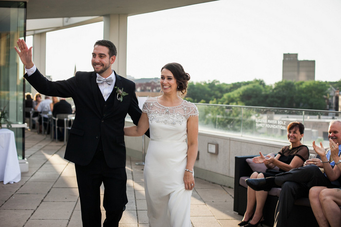 bride and groom making heir entrance at reception