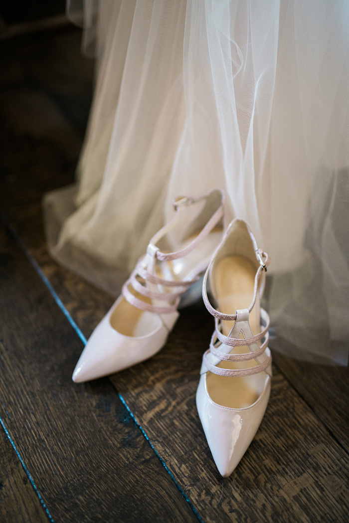 bride's white wedding shoes