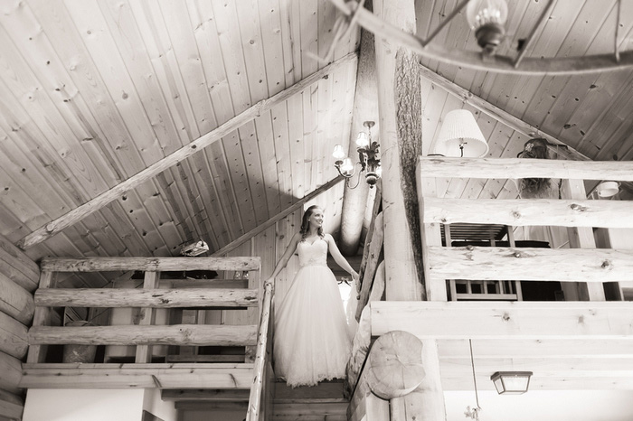 bride at top of cabin stairs