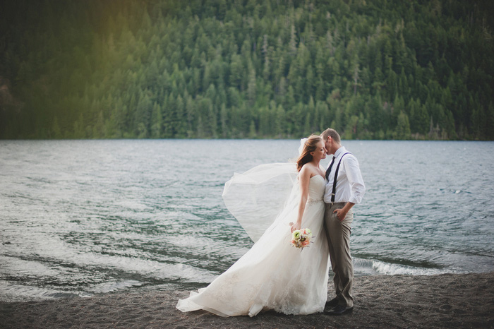 bride and groom portrait by the lake