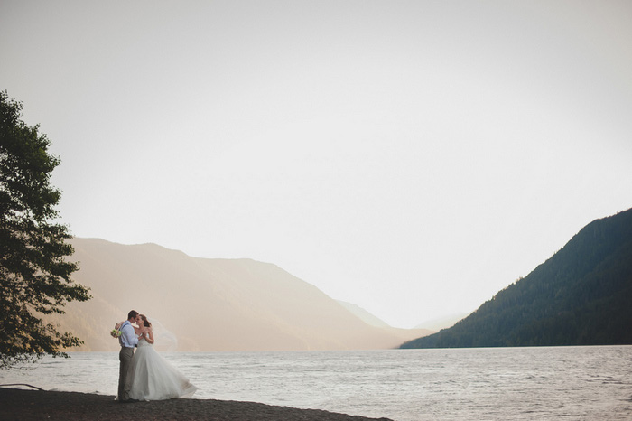 bride and groom portrait by the lake