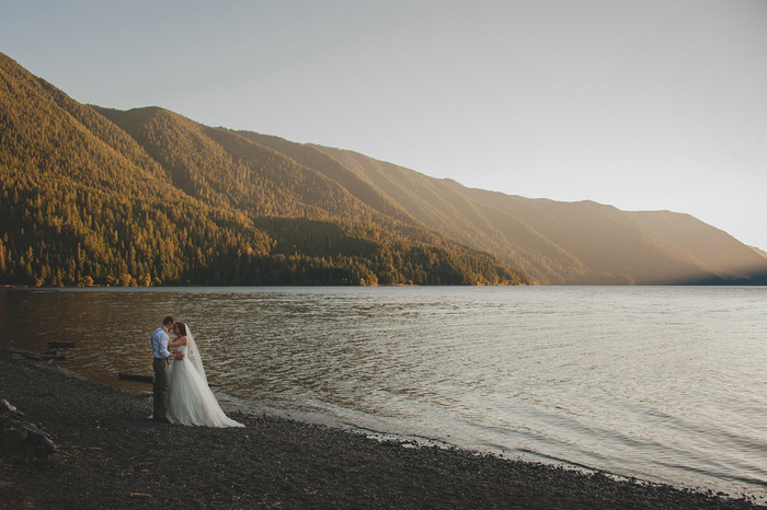 bride and groom portrait by the lake