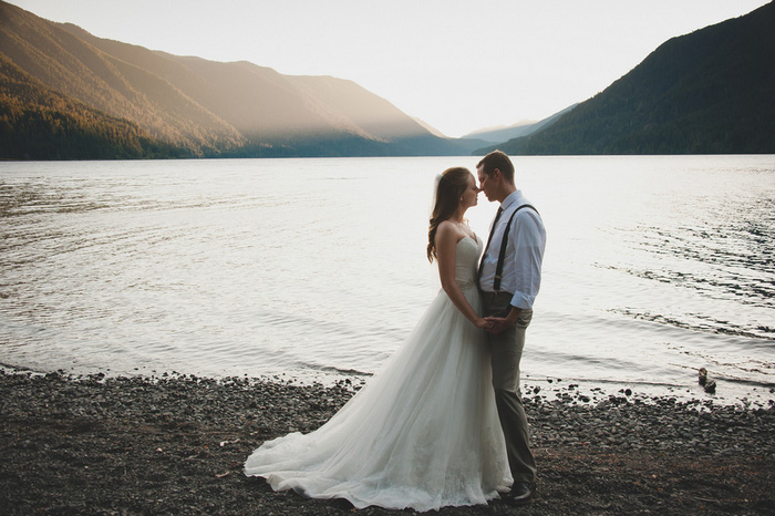 bride and groom portrait by the lake