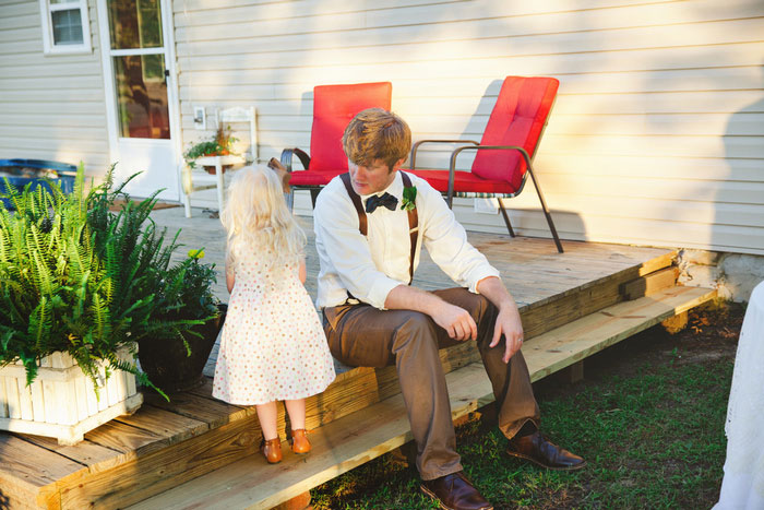 groom with young wedding guest