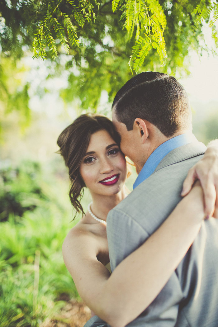 bride and groom embracing