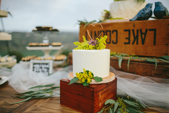 white cake with yellow flowers