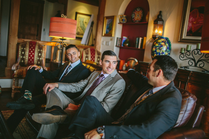 groom relaxing with his groomsmen