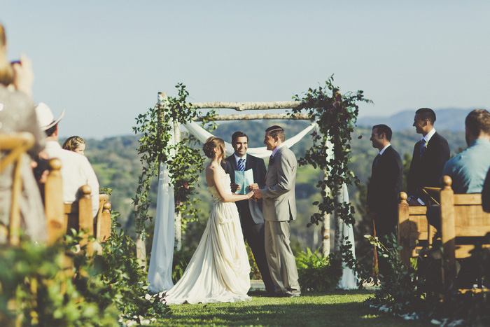 bride and groom up at the altar