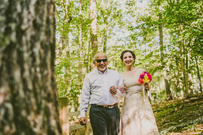 bride walking to ceremony with her father