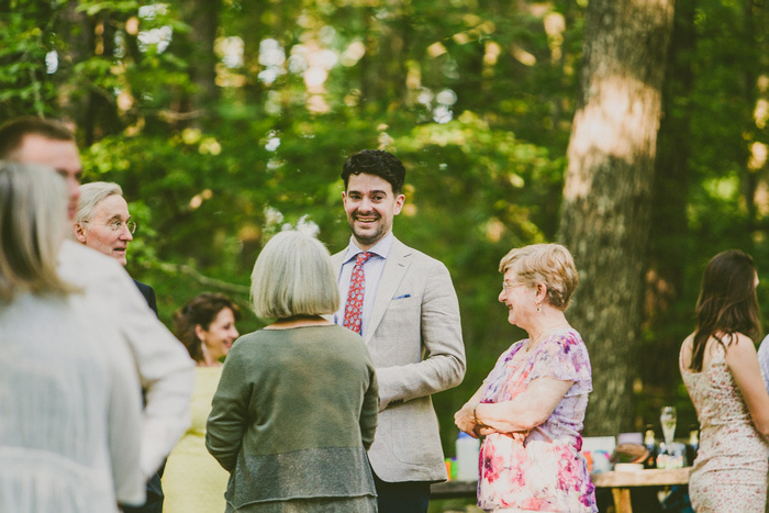 groom talking to guests