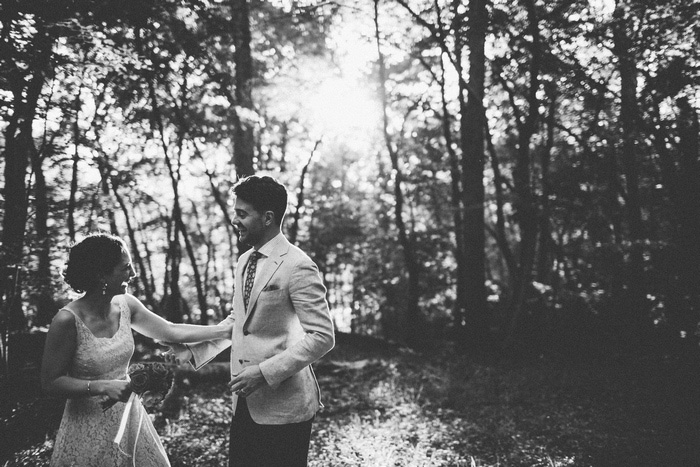 bride and groom in the woods