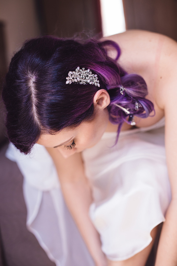 rhinestone hair comb in bride's purple hair