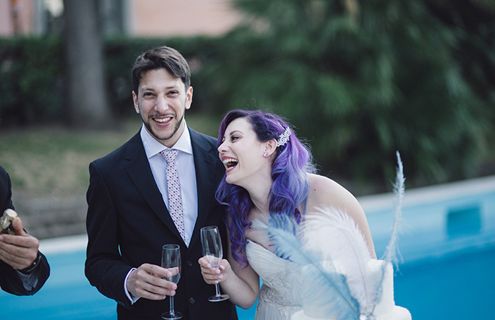 bride and groom laughing