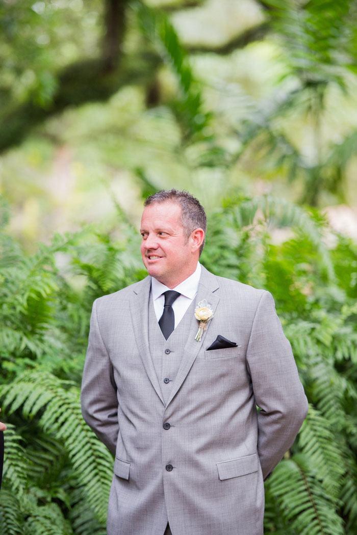 groom waiting at the altar