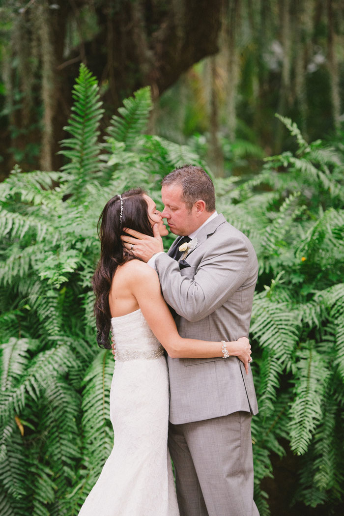 bride and groom first kiss