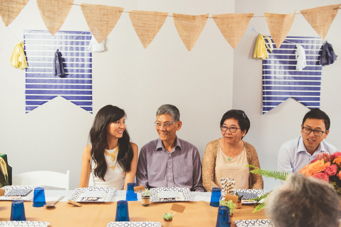 bride sitting with her parents