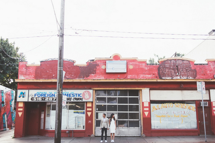 wedding portrait in front of auto body shop