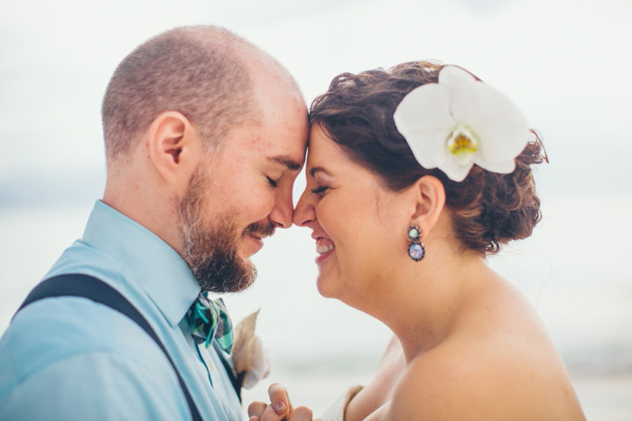 bride and groom head to head