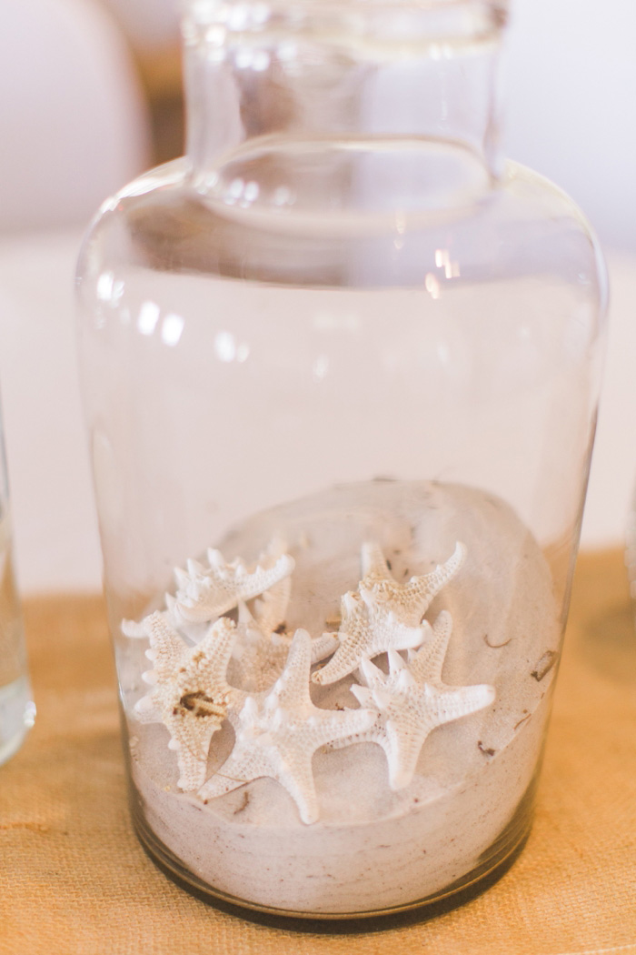 sand and seashell wedding centrepiece 