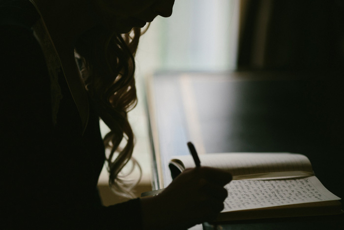 bride writing her vows