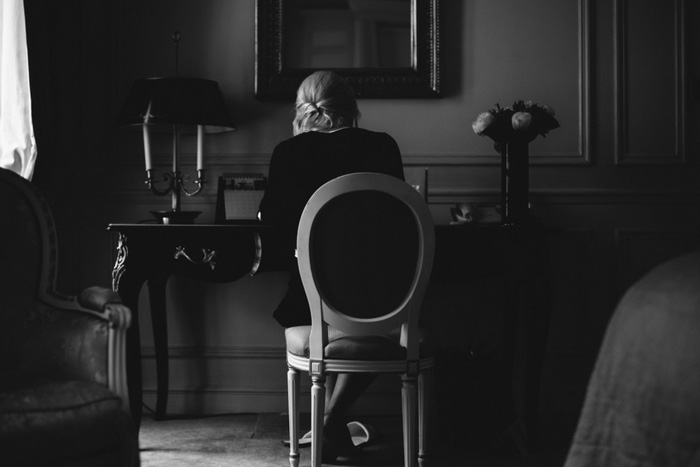 bride sitting at desk