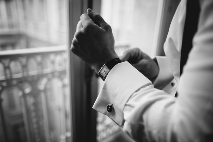 groom putting on his watch