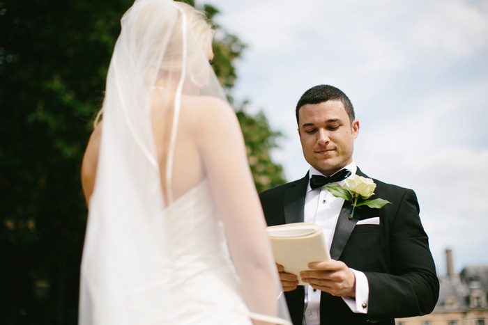 groom reading vows during elopement ceremony