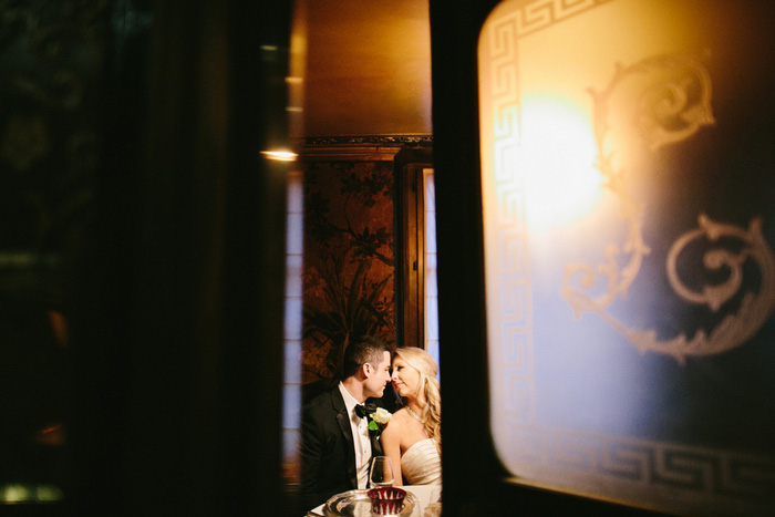 Bride and groom inside Paris restaurant