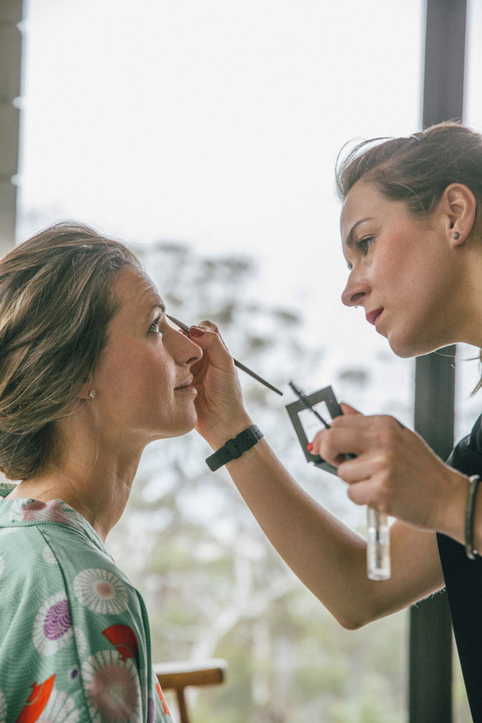 bride getting her make-up done