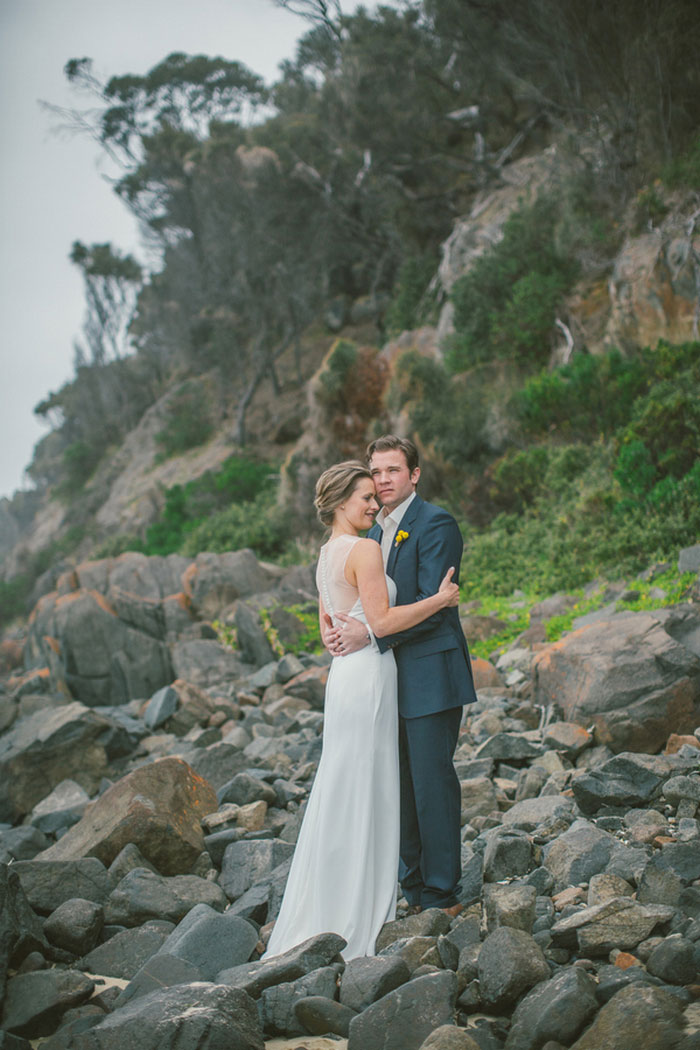 wedding portrait on rocky coast