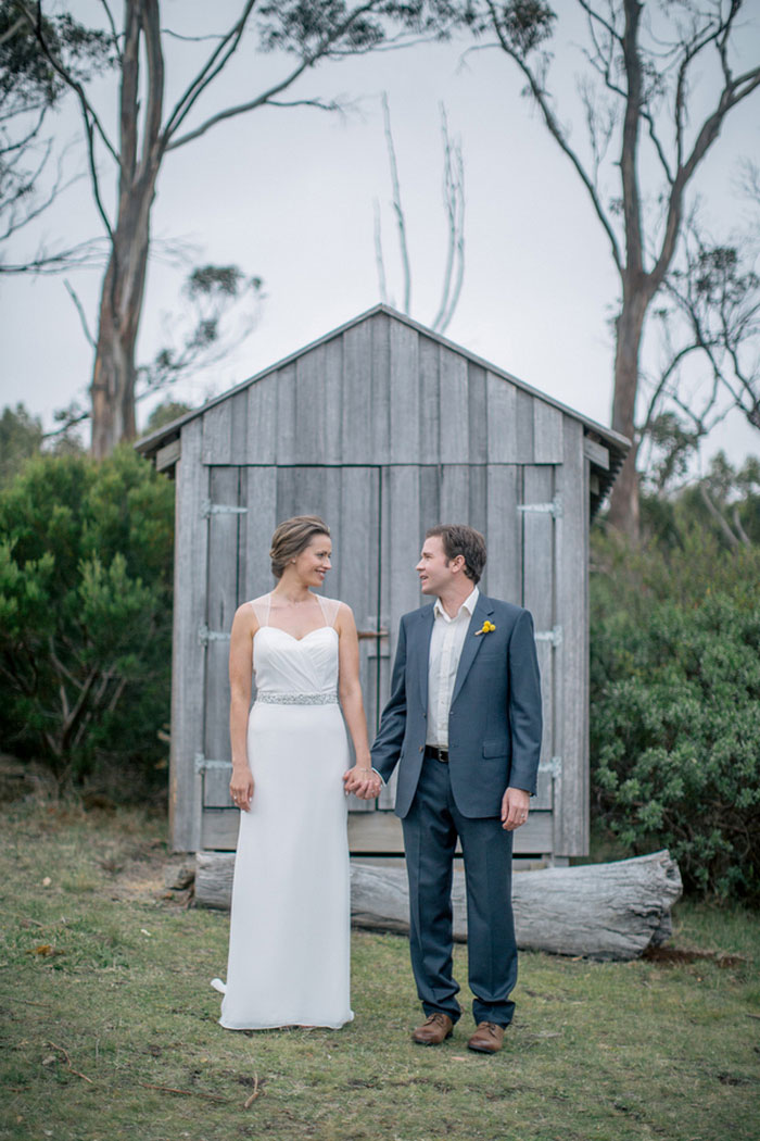 wedding portrait in front of shed