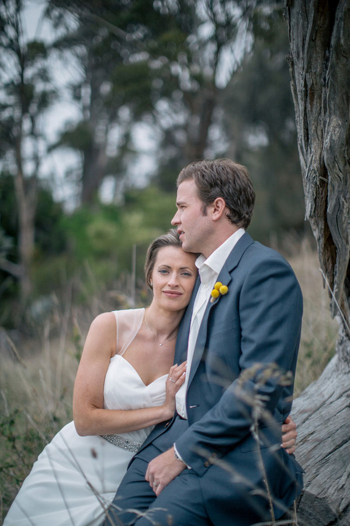 bride leaning on groom