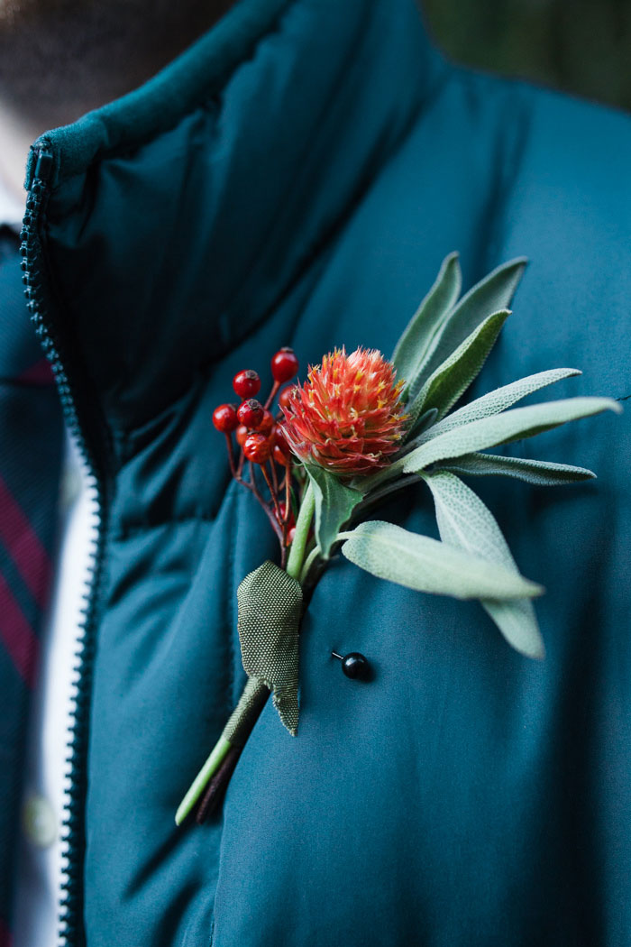 orange and red boutonniere
