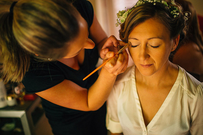 bride having her make-up done